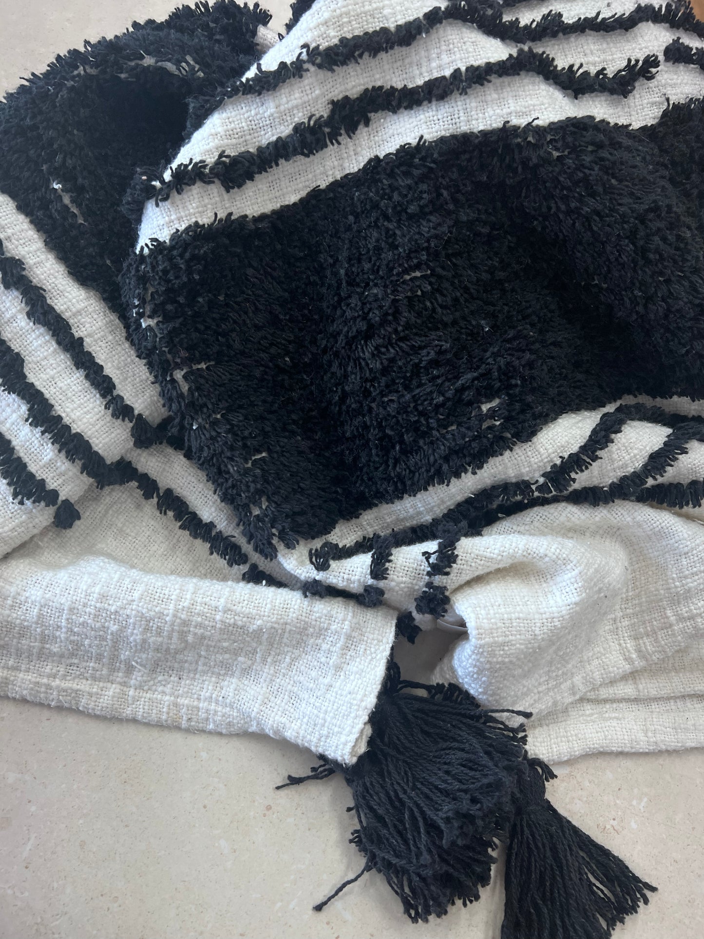 White / Black Tassel throw