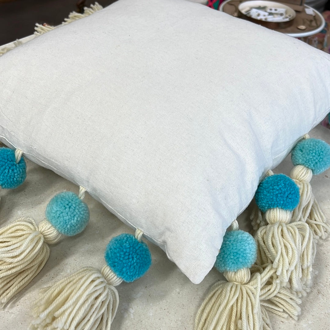 White tassel blue ball cushion